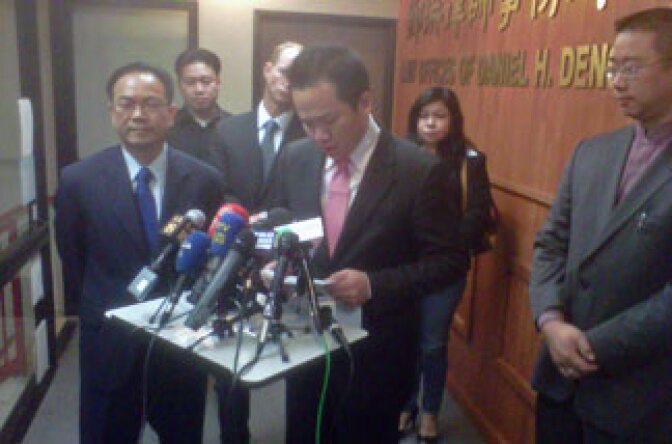 San Gabriel Mayor Albert Huang resigns at a news conference October 19, 2010