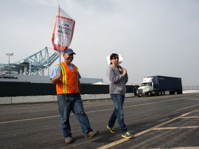 Clerical workers at the Port of Los Angeles protest outside of the APM Terminals on December 4th, 2012.