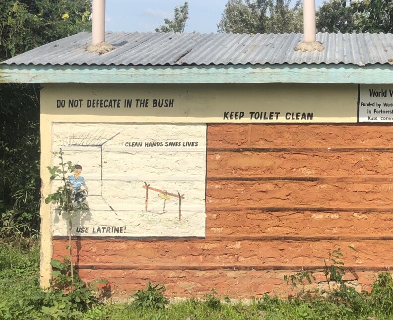 A sign in a Kenyan village urges people not to practice open defecation in the bush. About 673 million people openly defecate and the U.N. has called for "an end to open defecation" by 2030.