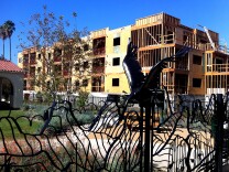 At Marsh Park in Frogtown, an example of development along the LA River as a condo building nears completion next to a multi-acre park.