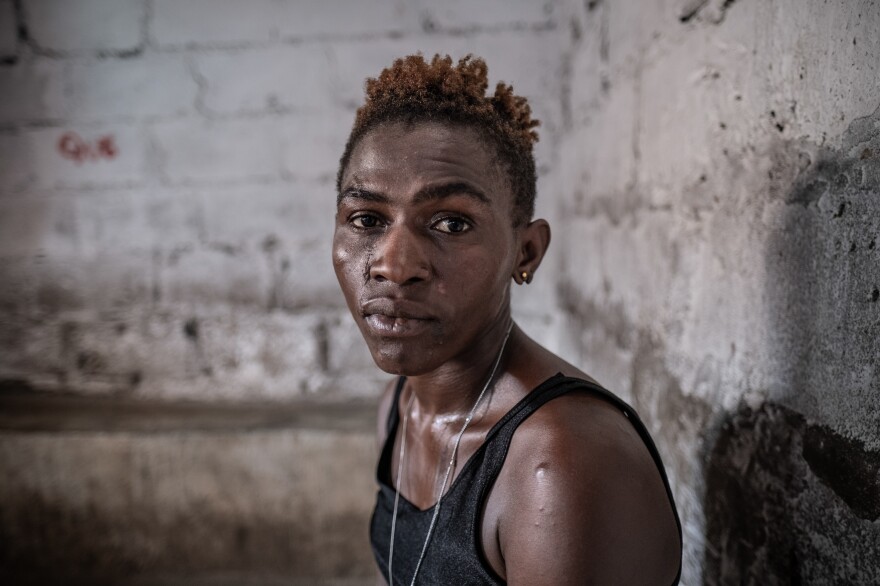 26-year-old Zainab Sankoh in a shack at the Kingtom dump site in Freetown, Sierra Leone. A self-described "hustler," Sankoh used to send money home to support her family and her young daughter in a village in the south of the country. Now, she spends almost all her money on kush. "My life is miserable" said Sankoh. "This is not the Zainab I used to be."