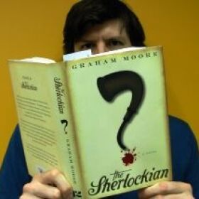 John Rabe casually persuses Graham Moore's debut novel.