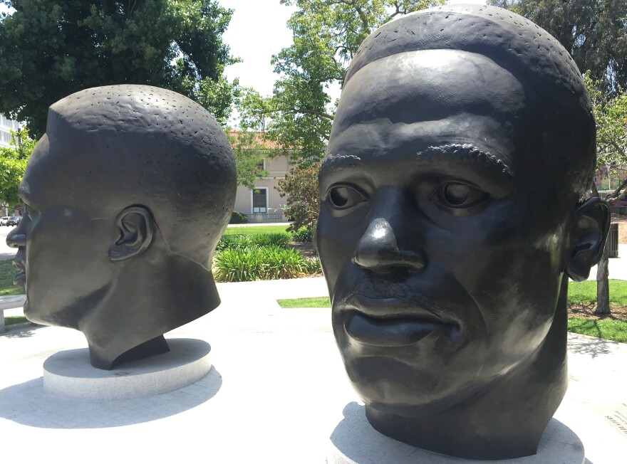 Ralph Helmick and John Outterbridge's statues of Mack and Jackie Robinson at Centennial Square in Pasadena