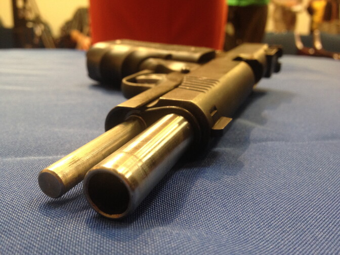 L.A. city prosecutors allege the 17-year old boy brought a gun similar to this one, a .45 caliber semi-automatic handgun, to his high school in Van Nuys. They are charging his mother with failing to safely secure the gun and others in the home. 