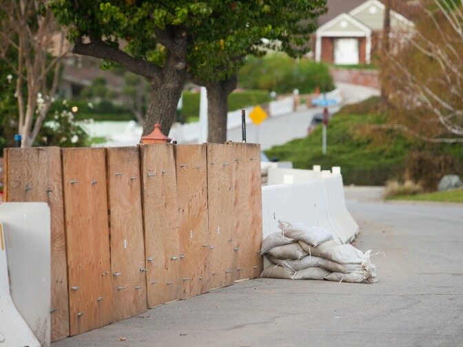 Glendora residents near Rainbow Drive prepare for an upcoming storm onThursday, Dec. 11, 2014.

(Photos by Susanica Tam/ for KPCC)