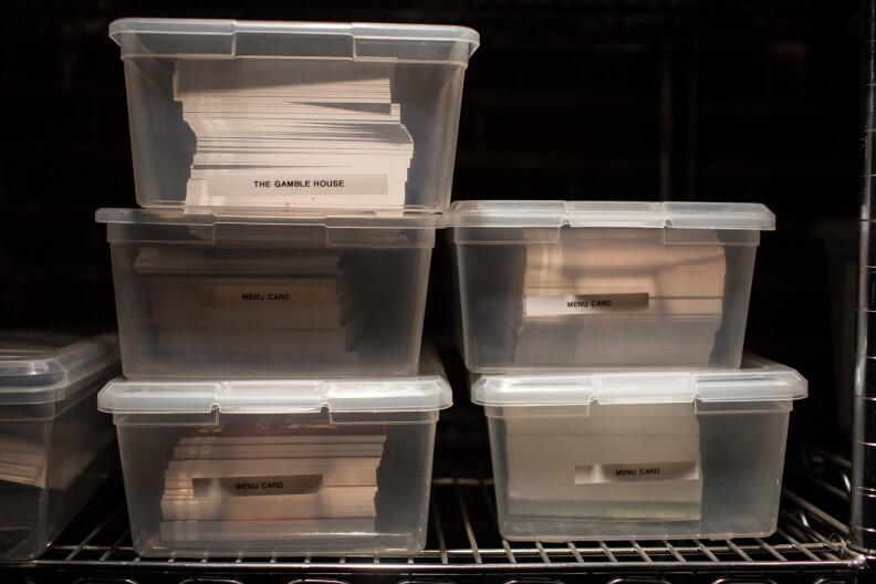 Bins for promotional materials are stored in the basement of the Gamble House.