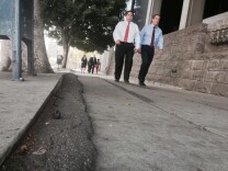L.A.'s plan to repair sidewalks would put the cost of repairs on adjacent commercial and government property owners, but in residential areas, the city would pay the costs.