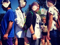 Four friends disguised as KPop stars EXO and Kyuhyun.