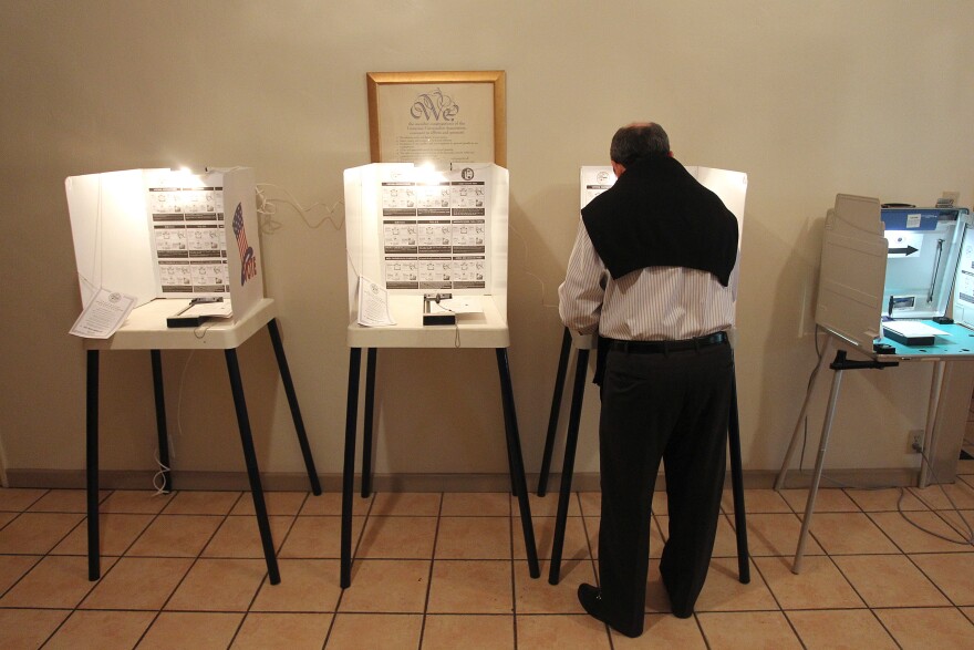 LOS ANGELES, CA - MAY 21: A man marks his ballot in an election that is expected to have very low voter turnout for the race between Los Angeles City Controller Wendy Greuel and Councilman Eric Garcetti for Los Angeles mayor on May 21, 2013 in Los Angeles, California. Greuel could become the first-ever woman mayor of Los Angeles in her bid to replace two-time mayor Antonio Villaraigosa. (Photo by David McNew/Getty Images)