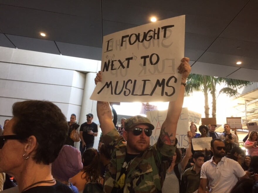 FILE PHOTO: Protesters gathered at Los Angeles International Airport on Sunday at Bradley International Terminal to protest President Trump's executive order temporarily banning migrants from seven Muslim-majority countries.