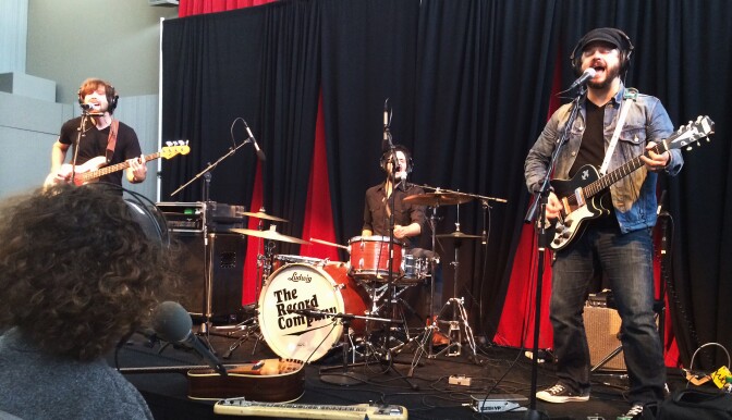Alex Cohen watches as The Record Company performs live at the Crawford Family Forum.