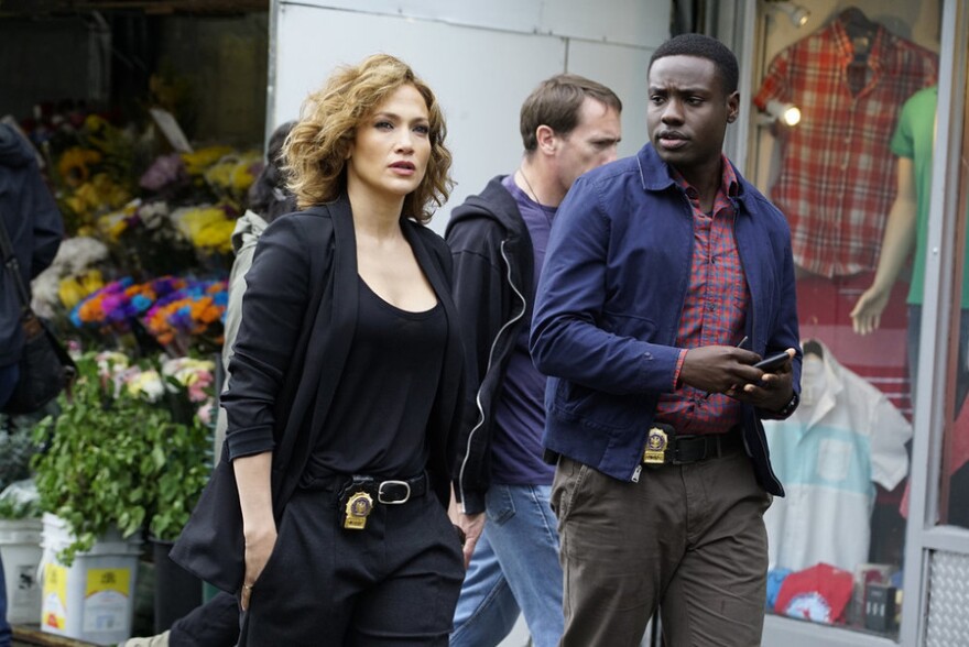 (l-r) Jennifer Lopez as Detective Harlee Santos, Dayo Okeniyi as Michael Loman in the NBC series "Shades Of Blue."