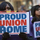 CHICAGO, IL - FEBRUARY 26:  Members of the Service Employees International Union (SEIU) hold a rally in support of the American Federation of State County and Municipal Employees (AFSCME) union at the Richard J. Daley Center plaza on February 26, 2018 in Chicago, Illinois. Today the U.S. Supreme Court is hearing arguments in Janus v. AFSCME, a lawsuit that challenges unions' authority under state law to collect compulsory fees from all employees they serve.  (Photo by Scott Olson/Getty Images)