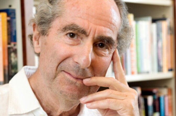 Author Philip Roth poses for a photo in the offices of his publisher Houghton Mifflin, in New York.