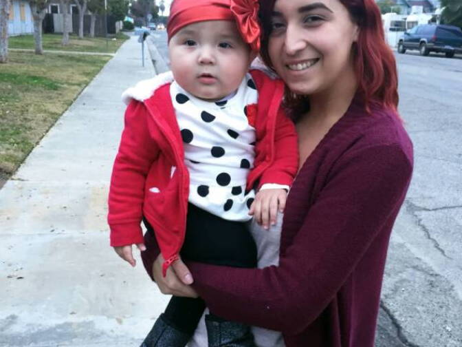 Cassandra Baca, 22, and her baby daughter, Amoriee. Baca says she’s too busy as a working single mom to think about voting.