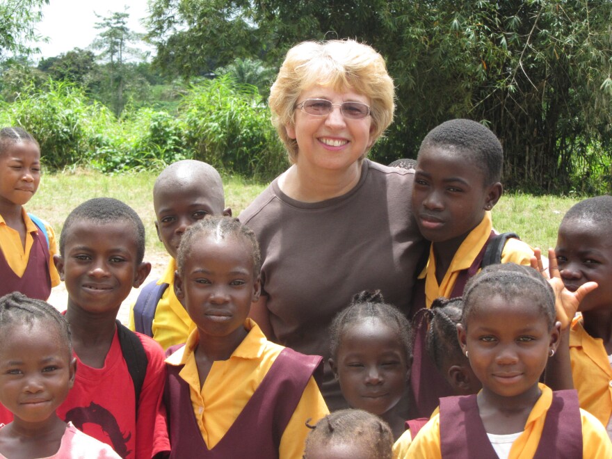 Nancy Writebol with children in Liberia. Writebol is one of two Americans working for a missionary group in Liberia that have been diagnosed with Ebola. 