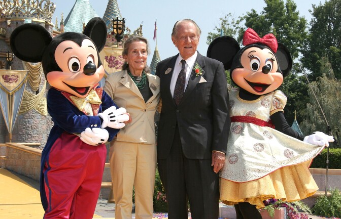 Diane Disney Miller, daughter of Walt Disney, poses with actor Art Linkletter, Mickey and Minnie Mouse at Disneyland's 50th Anniversary rededication ceremony held at Disneyland on July 17, 2005 in Anaheim, California.
