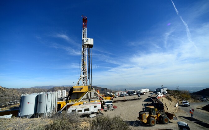 Crews from SoCalGas and outside experts work on a relief well at the Aliso Canyon facility above Porter Ranch on Dec. 9, 2015. Once the relief well is connected to the leaking well, SoCalGas will pump fluids and cement into the bottom of the leaking well to stop the flow of gas and permanently seal the well.