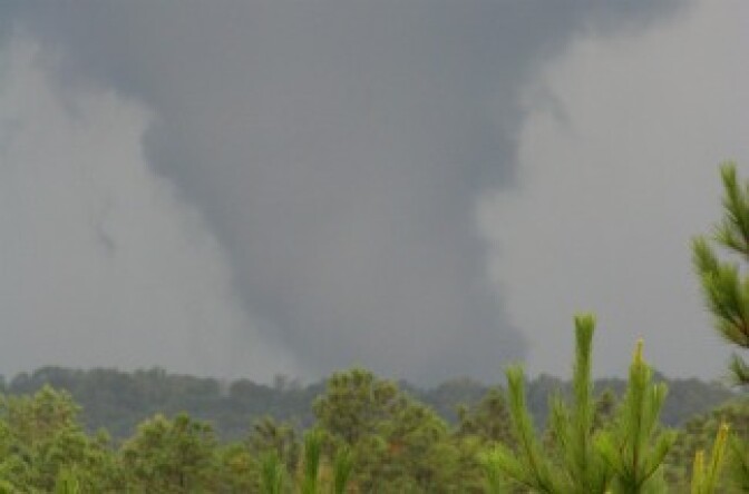 A tornado wields a path of destruction across Alabama.