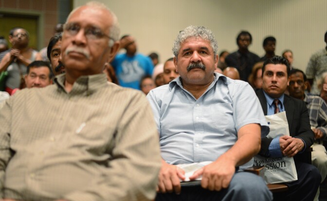 LOS ANGELES, CA - MAY 31: Job seekers attend an orientation meeting inside the church during Los Angeles Mission's 11th annual Skid Row Career Fair on May 31, 2012 in Los Angeles, California. According to a Labor Department report, the number of people seeking unemployment benefits rose last week to a five-week high. The same federal government agency said that weekly applications for unemployment aid rose 10,000 to a seasonally adjusted 377,000. (Photo by Kevork Djansezian/Getty Images)
