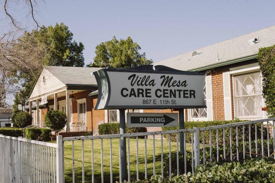 A sign outside a nursing home in Upland, California reads "Villa Mesa, parking"
