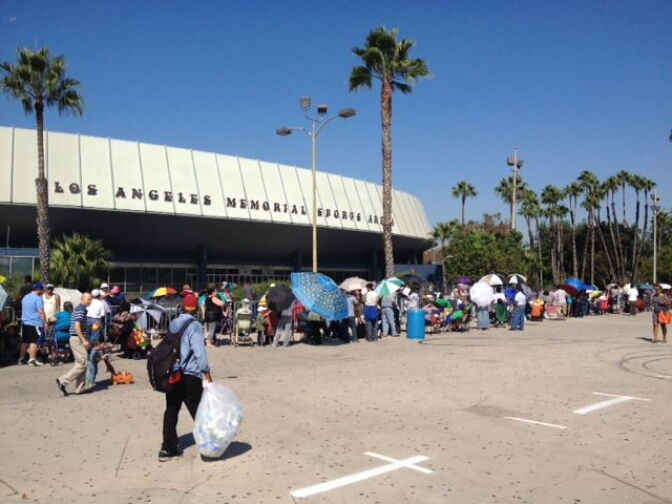 By late Monday morning, nearly 3,000 folks had lined up outside the L.A. Sports Arena to get an admission wristband for Thursday's free Care Harbor clinic.
