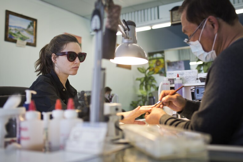 Musician Bianca Alatorre gets artificial nails on her right hand for playing guitar.