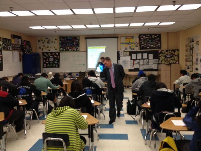 Superintendent John Deasy walks through an economics classroom at Los Angeles High School during a surprise visit.