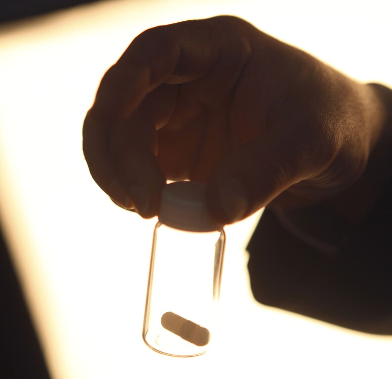In this April 13, 2010 photo, Dr. Stephen Ross shows an example of the pill a patient would take in a study on the effects of hallucinogenic drugs on the emotional and psychological state of cancer patients in New York. The pill could could either contain a placebo or psilocybin, the psychoactive ingredient in hallucinogenic mushrooms. (AP Photo/Seth Wenig)