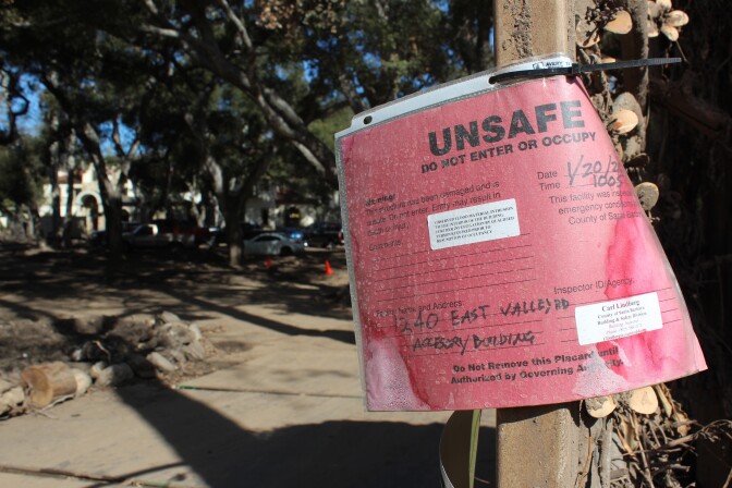 On Thurs., March 8, 2018, a "red tag" marked the front gate of a Montecito home that Santa Barbara County officials have deemed unsafe to enter in the wake of a devastated mudslide in January 2018.