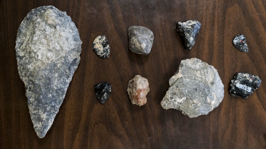 Assortment of Early and Middle Stone Age tools found in the Olorgesailie Basin, Kenya. The tool at left is a hand axe.