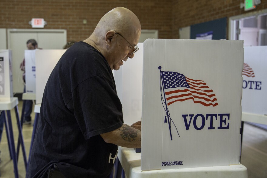 Edmund Lara casts his ballot at a polling center in Boyle Heights on Tuesday, June 5, 2018.