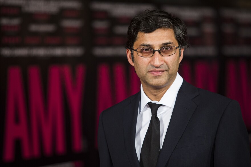 British director Asif Kapadia poses for photographers on the red carpet at the premiere of the film Amy in central London on June 30, 2015. The documentary, which features archive footage and previously unreleased tracks, is about the life of six-time Grammy award winning British singer Amy Winehouse who died in 2011 aged 27 from alcohol poisoning.
 AFP PHOTO / JACK TAYLOR        (Photo credit should read JACK TAYLOR/AFP/Getty Images)