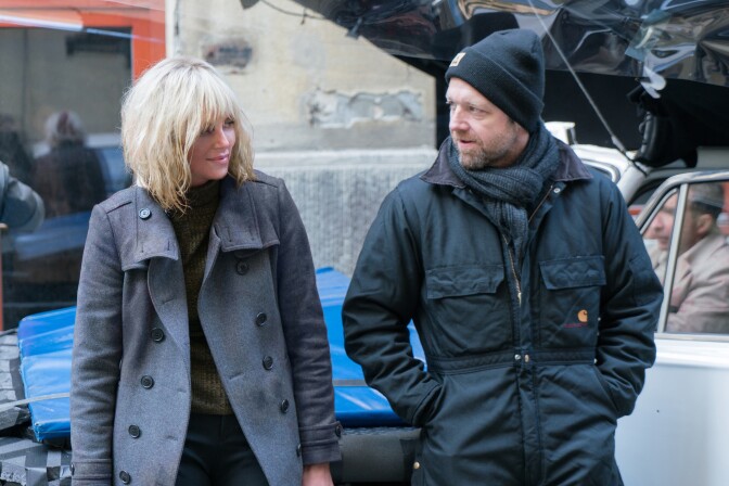 Charlize Theron as Lorraine Broughton and director David Leitch on the set of "Atomic Blonde."