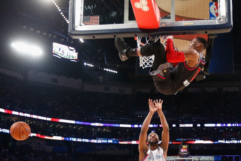 Russell Westbrook of the Oklahoma City Thunder dunks the ball as Kemba Walker of the Charlotte Hornets reacts during the 2017 NBA All-Star Game on February 19, 2017 in New Orleans, Louisiana.