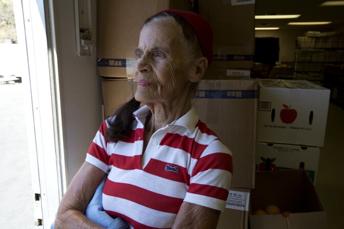 Pegi Chilton, Assistant Manager  of Jensons takes a break from her work to reflect in Wrightwood California on August 18th, 2016.