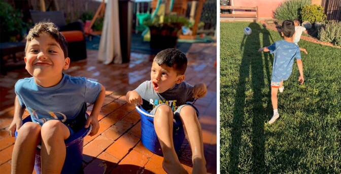 Richard's two sons sit in buckets and play soccer.