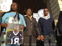 File photo: The family of Kendrec McDade and attorney Caree Harper at a rally at Pasadena City Hall.