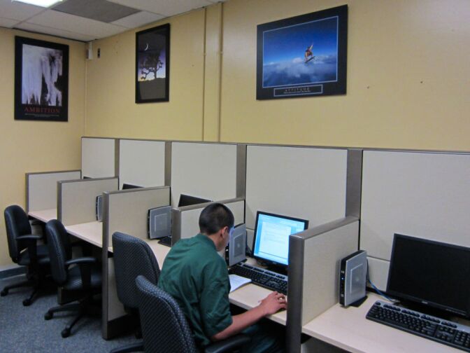 A student sits at a flat-screen computer in L.A. County's Challenger probation camp's new AdvancePath Academy, the first such credit-recovery program in a lockup environment.