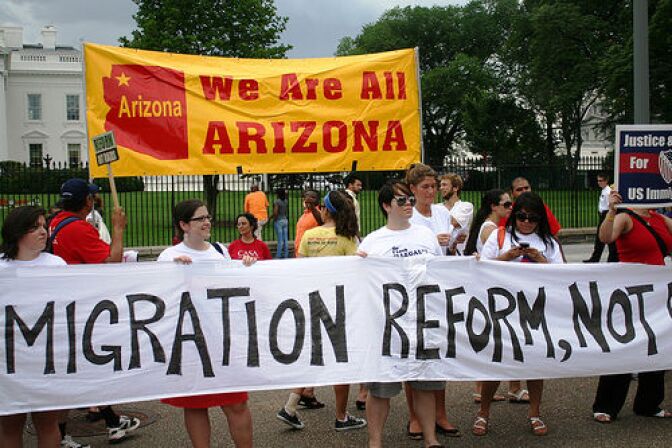 Protestors in Washington D.C. call for immigration reform in the wake of Arizona Governor Jan Brewer's signing of SB 1070 in 2010. Oral arguments over the constitutionality of the law began in the Supreme Court on Wednesday.