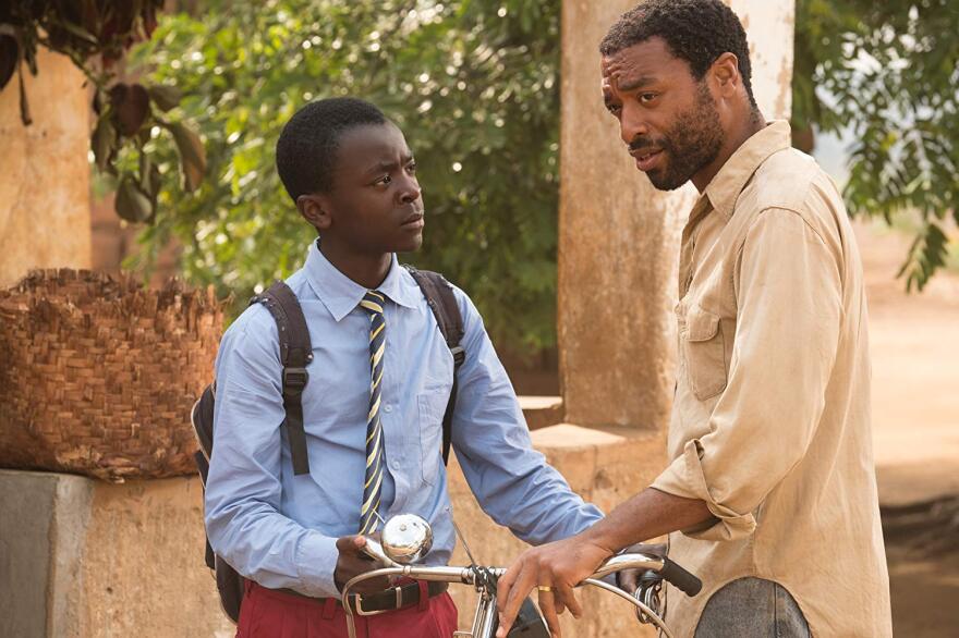 Chiwetel Ejiofor (R) wrote, directed and stars in (with Maxwell Simba) "The Boy Who Harnessed The Wind."
