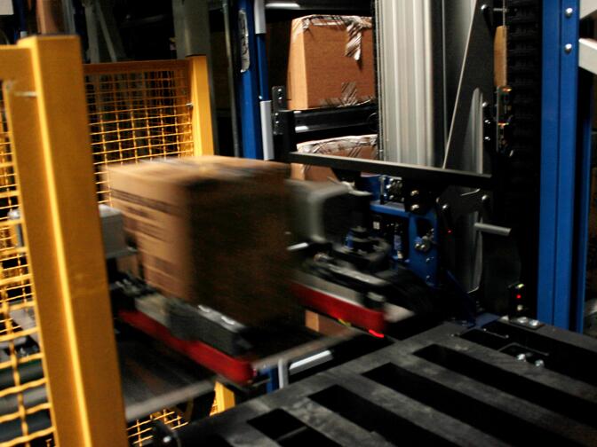 Fast moving automated retrieval system in action at the Skechers distribution center in Moreno Valley.