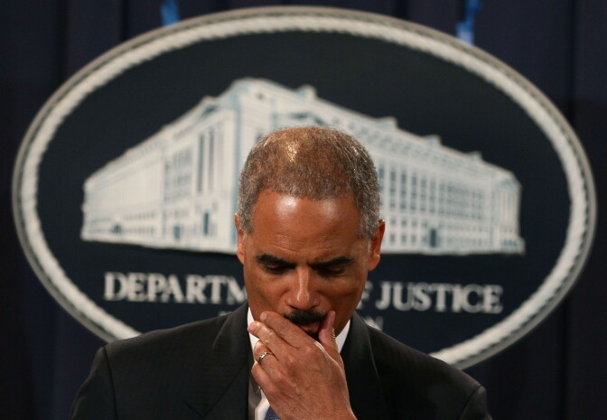 WASHINGTON, DC - AUGUST 03:  Attorney General Eric Holder speaks about an international child pronography investigation during a news conference at the Justice Department on August 3, 2011 in Washington, DC. Attorney General Holder announced the results of an ongoing investigation that has targeted hundreds of individuals around the world for their alleged participation in an online bulletin board that was created and operated to promote pedophilia, and to encourage the sexual abuse of children.  (Photo by Mark Wilson/Getty Images)