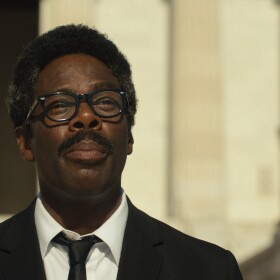 Colman Domingo as Bayard Rustin stares off into the distance in front of the Lincoln Monument.