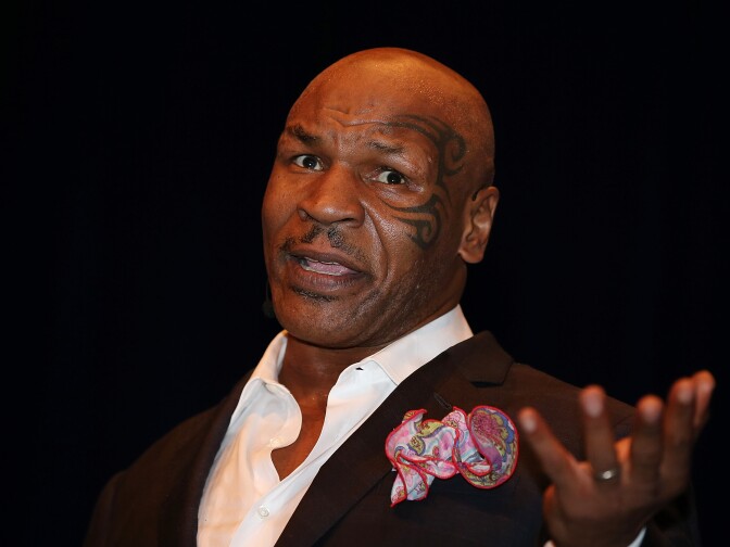 Mike Tyson speaks on stage during his speaking tour, "Day of the Champions" at the Brisbane Convention & Exhibition Centre on November 16, 2012 in Brisbane, Australia.  