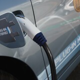 SAN FRANCISCO - AUGUST 25:  A power cable from a vehicle charging station is seen plugged into the side of a Toyota Prius plug-in hybrid August 25, 2010 in San Francisco, California. With sales of electric and plug-in hybrid cars expected to increase in the coming years, the Bay Area Air Quality Management District has set aside $5 million to increase the number of electric car charging stations to 5,000 around the Bay Area. There are currently 120 stations in the area.  (Photo by Justin Sullivan/Getty Images)