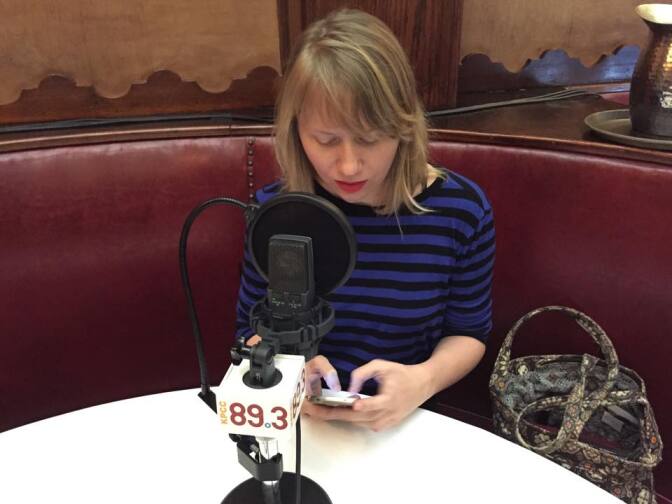 Filmweek Contributor and LA Weekly Movie Critic Amy Nicholson going over her notes before talking Oscar bait with John Rabe