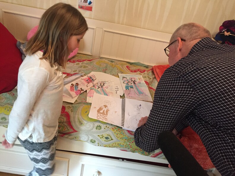 Claire Keane’s father, Disney animation legend Glen Keane reviews sketches his granddaughter Matisse has done at her home in Venice. The Keane family has an impressive resume of artistic talent from cartoonist Bil Keane of “The Family Circus,” to Glen Keane’s animation work at Disney on “The Little Mermaid,” “Aladdin,” “Beauty and the Beast,” to now Claire Keane’s work on the Disney animated movie and TV series “Tangled.” Photo by Erika Aguilar. 



