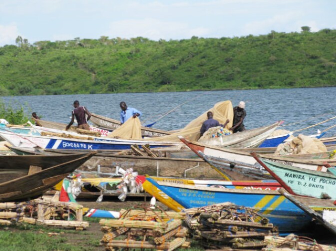 At Osindo Beach, local fishermen come in from fishing on Lake Victoria. Some fishermen are reluctant to get circumcised because they would miss three days of work.