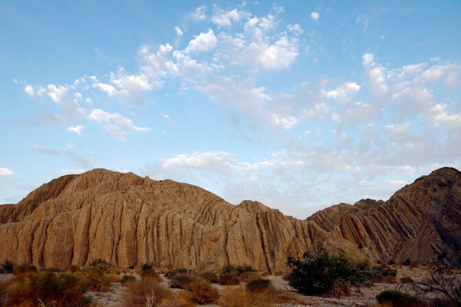 MECCA, CA - JULY 3:  Layers of earth are pushed into vertical positions by the collision of the Pacific and North American tectonic plates along the southern San Andreas Fault north of the Salton Sea on July 3 near Mecca, California. Scientists have discovered that human-created changes effecting the Salton Sea appear to be the reason why California's massive "Big One" earthquake is more than 100 years overdue and building up for the greatest disaster ever to hit Los Angeles and Southern California. Researchers found that strands of the San Andreas Fault under the 45-mile long rift lake have have generated at least five 7.0 or larger quakes about every 180 years. This ended in the early 20th century when authorities stopped massive amounts of Colorado River water from periodically flooding the into this sub-sea level desert basin. Such floods used to regularly trigger major quakes and relieve building seismic pressure but the last big earthquake on the southern San Andreas was about 325 years ago. Dangerous new fault branches that could trigger a 7.8 quake have recently been discovered under the Salton Sea.  (Photo by David McNew/Getty Images)